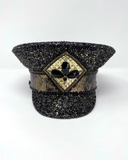 Authentic up cycled military captain hat, fully lined, hand embellished with black and gold glitter mix, beautifully hand detailed with gold and brown marble effect faux leather, gold leatherette, crystals and rhinestones. costume hat, festival hat, festival outfit, statement hat, high end hats, high end party wear, where to buy captain hats, stage wear, unique fashion, custom stagewear, festival essentials, festival headwear, halloween outfit, burning man hat, army hat, made in the UK