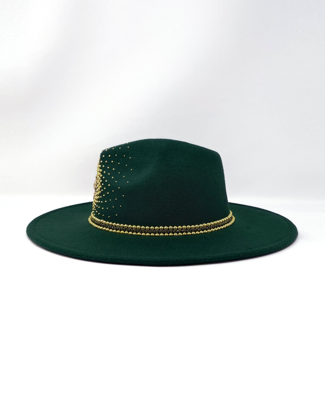 Forest Green Fedora. Gold sun and moon centre motif design,  hand embellished with a gold pearl scatter. crystal and gold rhinestone band. ladies day hat, festival hat, boho, wide brim, moss green, wool hat , designer hat, festival hat, best fedora hat brand, festival fashion, hand embellished, made in the UK, ethical fashion brand, custom fedora, festival essentials, felt hat, statement hat, classic fedora, festival outfit inspiration, unique fashion