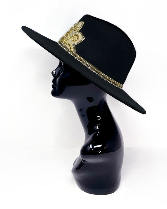Black wide brim fedora hat. Gold faux leather lotus motive hand embellished with gold metal clasped crystals & pearl like rhinestones. ladies day, festival hat, crystals, felt hat, boho, wool hat, classic hat, best fedora brand, festival outfit, leatherette