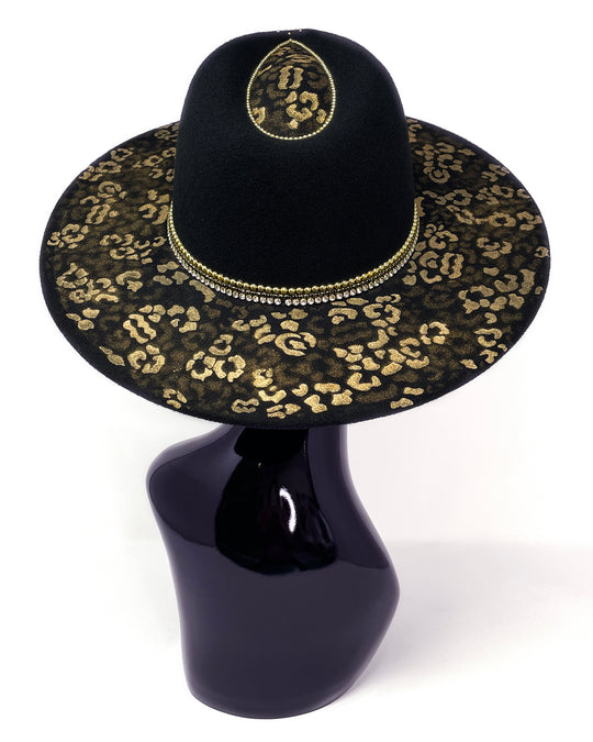 Black wide brim fedora hat. Gold metal & crystal leopard motive, hand painted metallic gold leopard print, embellished with gold metal clasped crystals & pearl like rhinestones. ladies day, festival hat, crystals, felt hat, boho, festival outfit, hat, handmade hat, festival wardrobe, gold hat, party hat