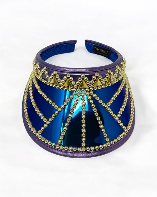 Purple faux leather sun visor hat with royal blue reflective and royal blue glitter under peak. Embellished with gold colour metal triangle rivets and metallic gold pearl like rhinestones. Disco hat, festival hat, dance wear, stage wear, festival fashion, party hat, rave outfit