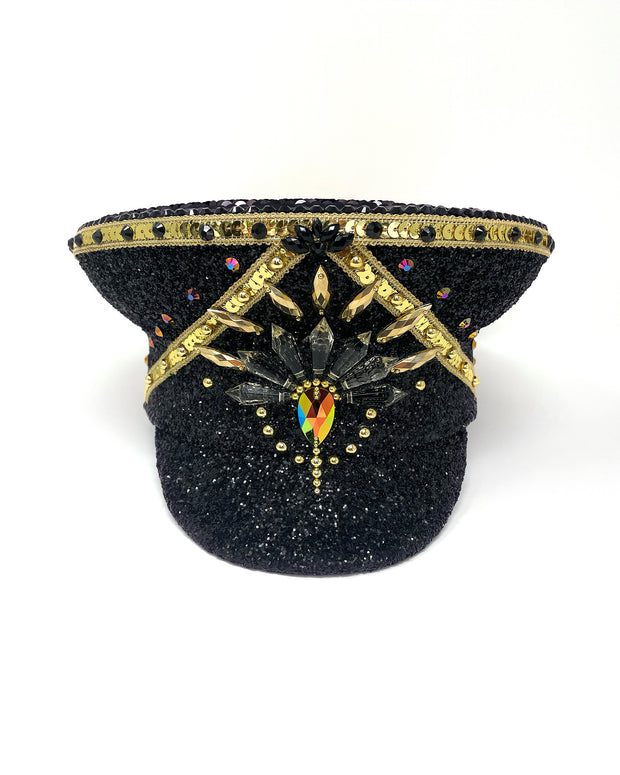 Black and gold glitter captain hat embellished with rhinestones and gems. flip mermaid sequin top. Metallic, crystals, costume captain hat, military hat, army hat, festival hat, up cycled captain hat, best captain hats, hats for the stage, rave outfit, statement hat, stage wear