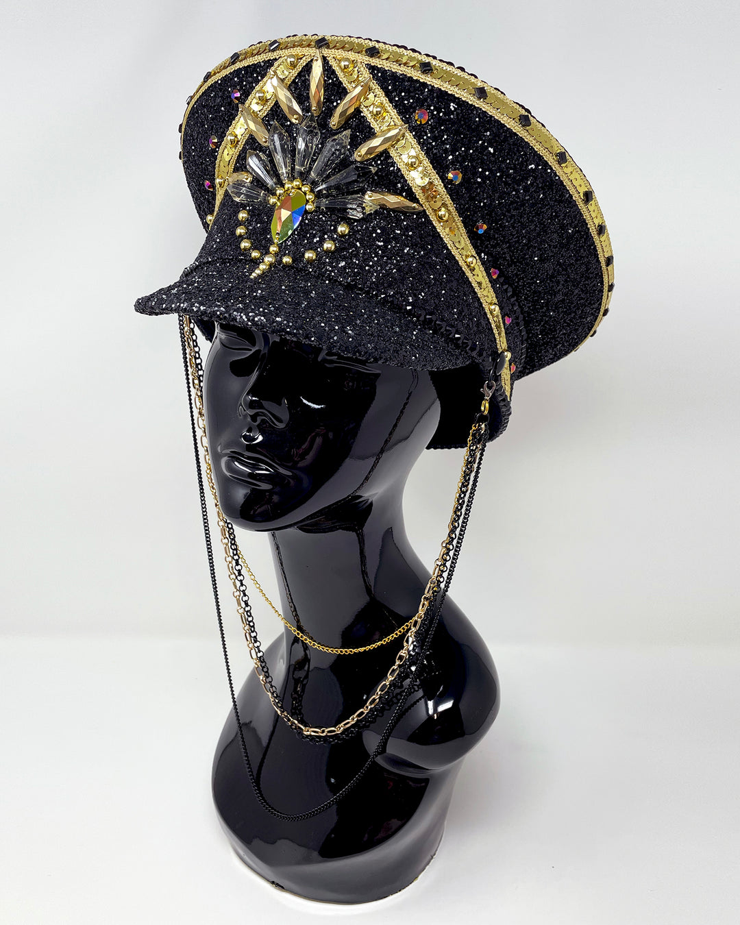 Black and Gold captain hat. Authentic up cycled military hat, fully lined, hand embellished with black glitter mix. Black gold flip sequin top, hand detailed with sequin trim, crystals and rhinestones. costume hat, festival hat, festival outfit, statement hat, high end hats, high end party wear, where to buy captain hats, stage wear, unique fashion, festival essentials, festival headwear, halloween, burning man hat, army hat, rave outfit, festival style, unique fashion, mermaid sequin, hats for rent