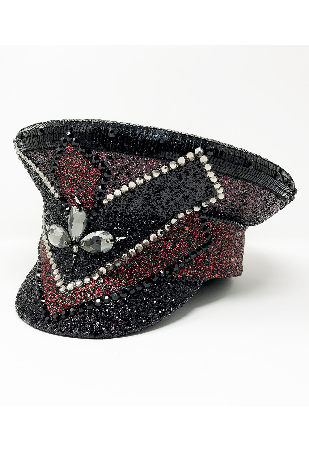 Black and red captain hat, Authentic up cycled military hat, fully lined, hand embellished with black and red glitter mix, beautifully hand detailed with black and red glitter faux leather, square sequin trim, crystals and rhinestones. costume hat, festival hat, festival outfit, statement hat, high end hats, high end party wear, where to buy captain hats, stage wear, unique fashion, custom stagewear, festival essentials, festival headwear, halloween outfit, burning man hat, army hat, made in the UK, rave