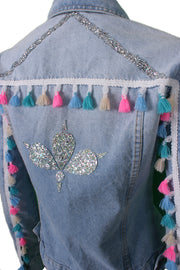 Light-wash denim jacket with tassel sleeves and crystal trims