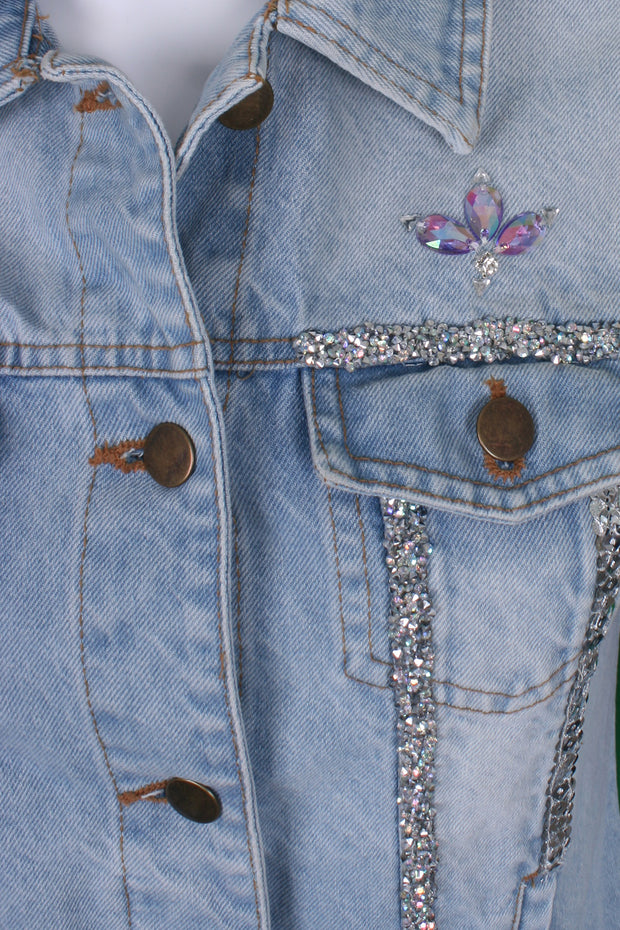 Light-wash denim jacket with tassel sleeves and crystal trims