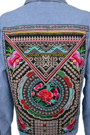 Light-wash denim jacket aztec rose embroidery with rips