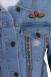Light-wash denim jacket aztec rose embroidery with rips